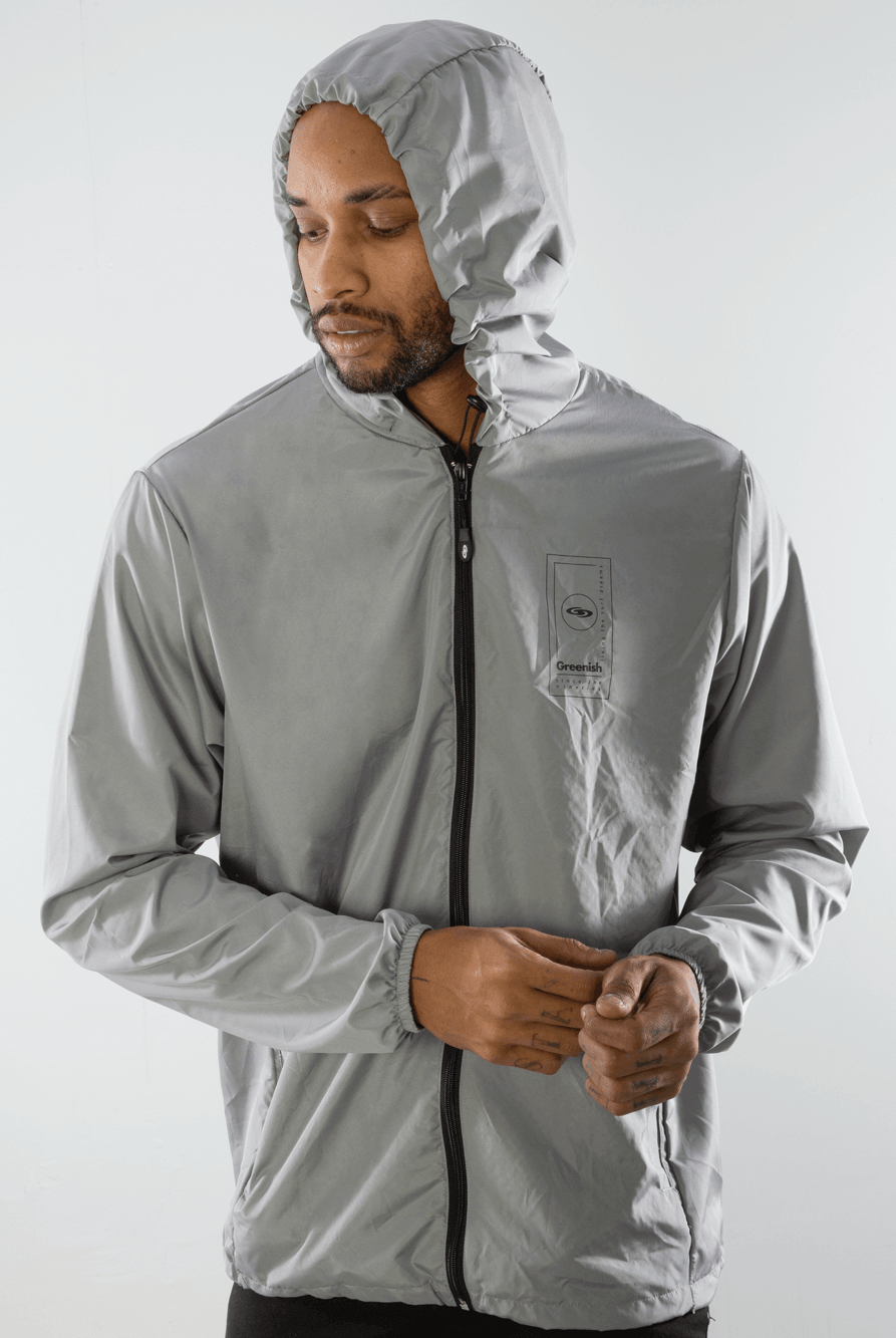 Cortavento Dreamms cinza da Greenish, leve e portátil, ideal para ventos intensos e aventuras.
