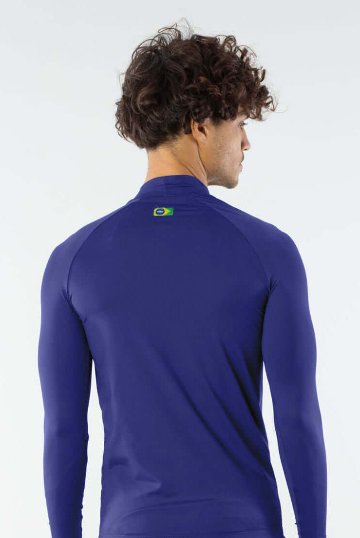 Camiseta UV manga longa azul da Greenish, ideal para esportes aquáticos, proteção UV e conforto.