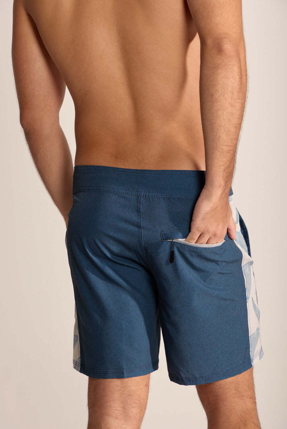 Back view of Boardwalk Live the Simple swim shorts in azul marinho, featuring an adjustable waist and hidden zip pocket.