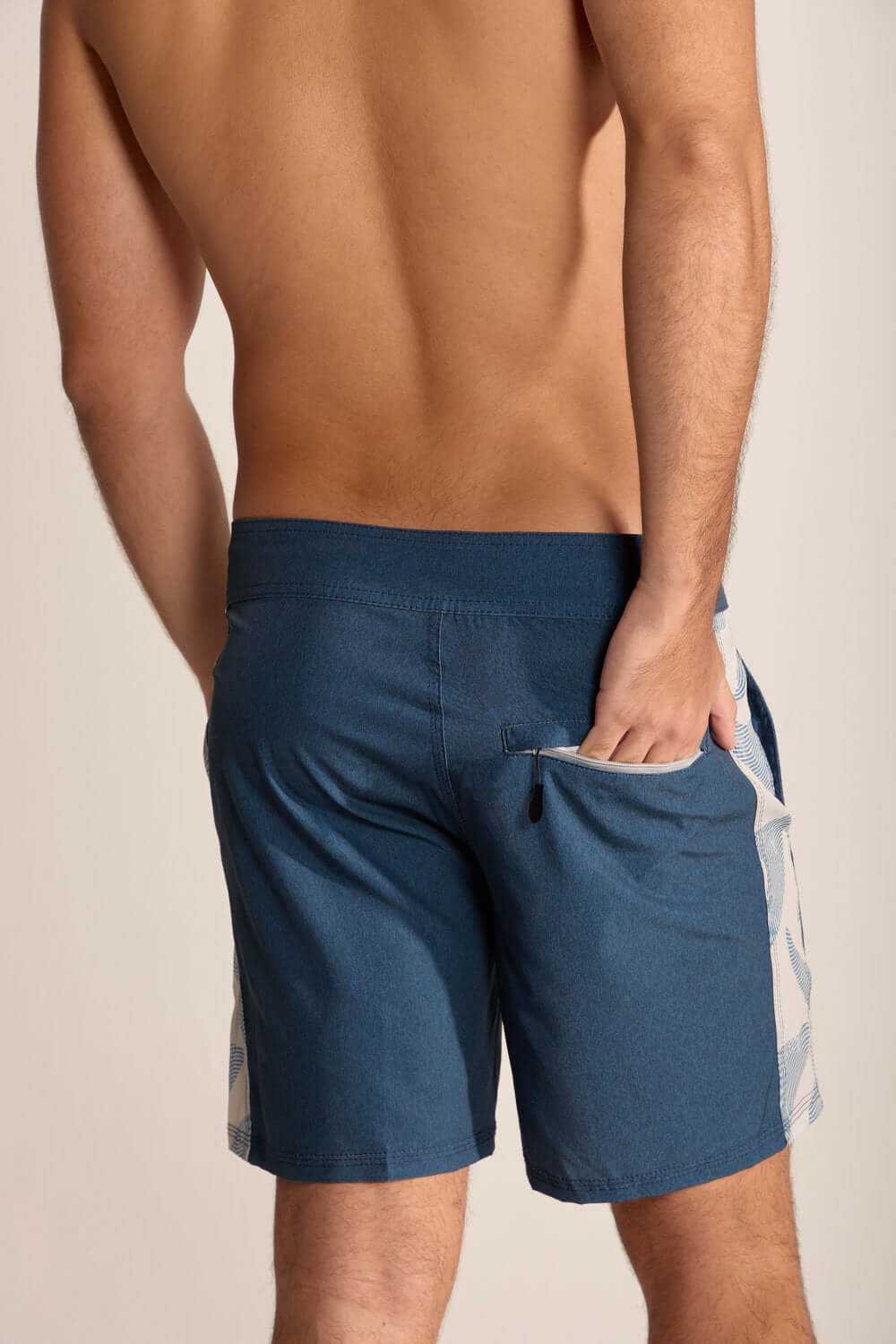 Back view of Boardwalk Live the Simple swim shorts in azul marinho, featuring an adjustable waist and hidden zip pocket.