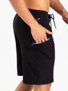 Greenish Total Stretch boardshorts in preto, designed for performance and quick-drying adventures.