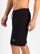 Greenish Total Stretch boardshort in black, designed for high performance water sports and quick drying.