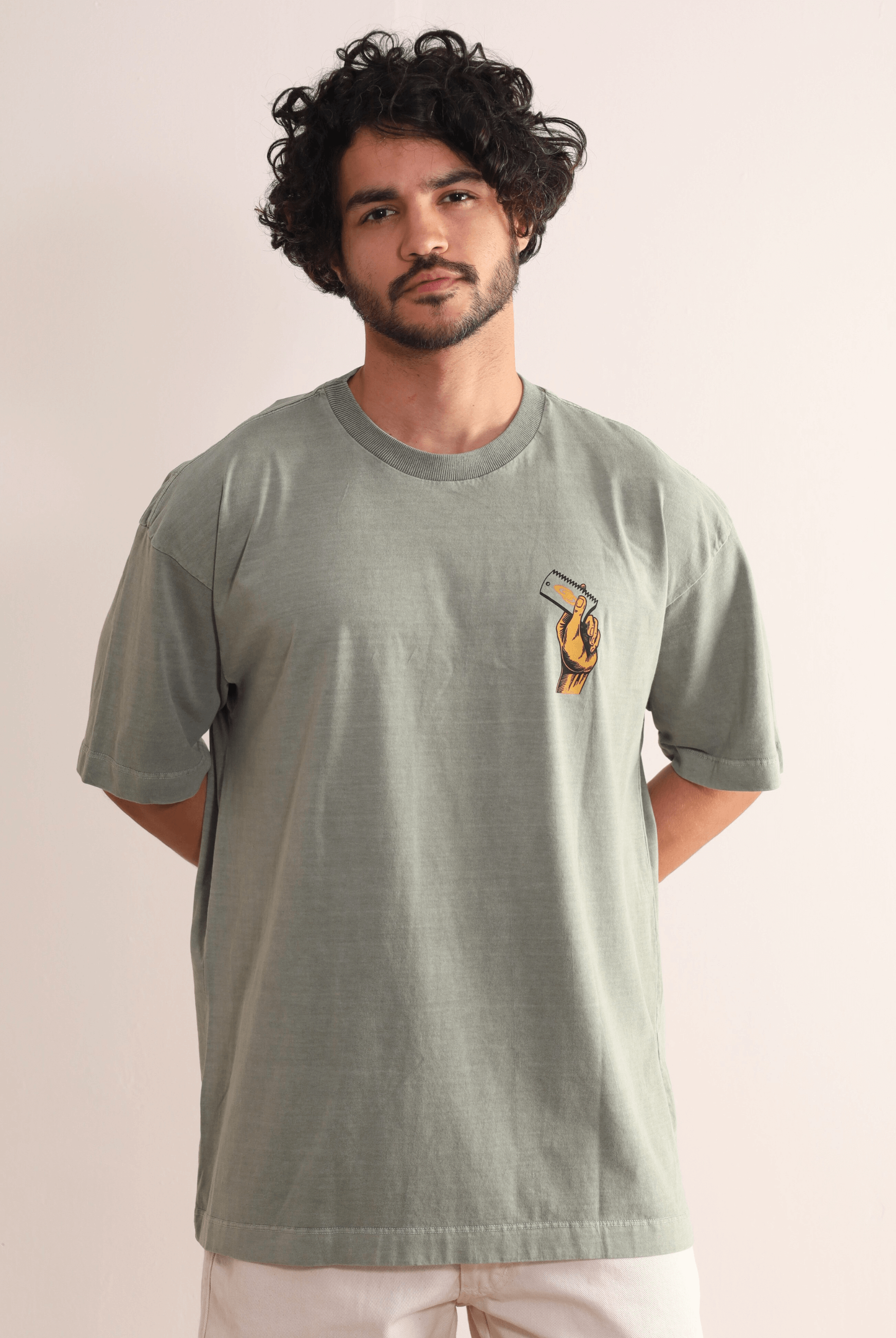 Camiseta Oversized Stone Surf Session - verde da Greenish com design retrô vibrante, modelagem solta em algodão e símbolo de liberdade.
