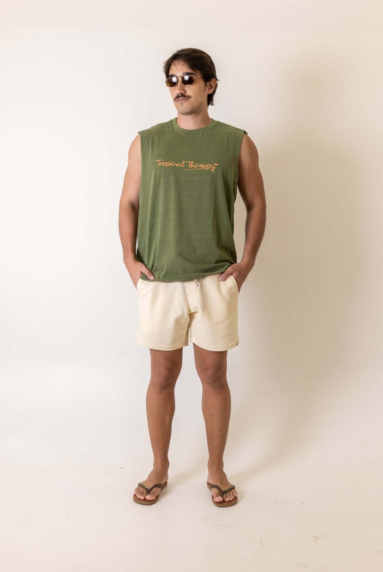 Greenish Regata Larga Tropical Terapy - Verde sleeveless shirt featuring a relaxed fit, perfect for casual wear.
