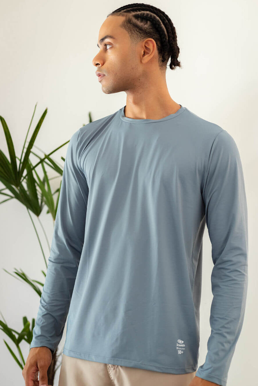 Camisa UV Manga Longa Basic em turquesa da Greenish, ideal para atividades ao ar livre e proteção solar.