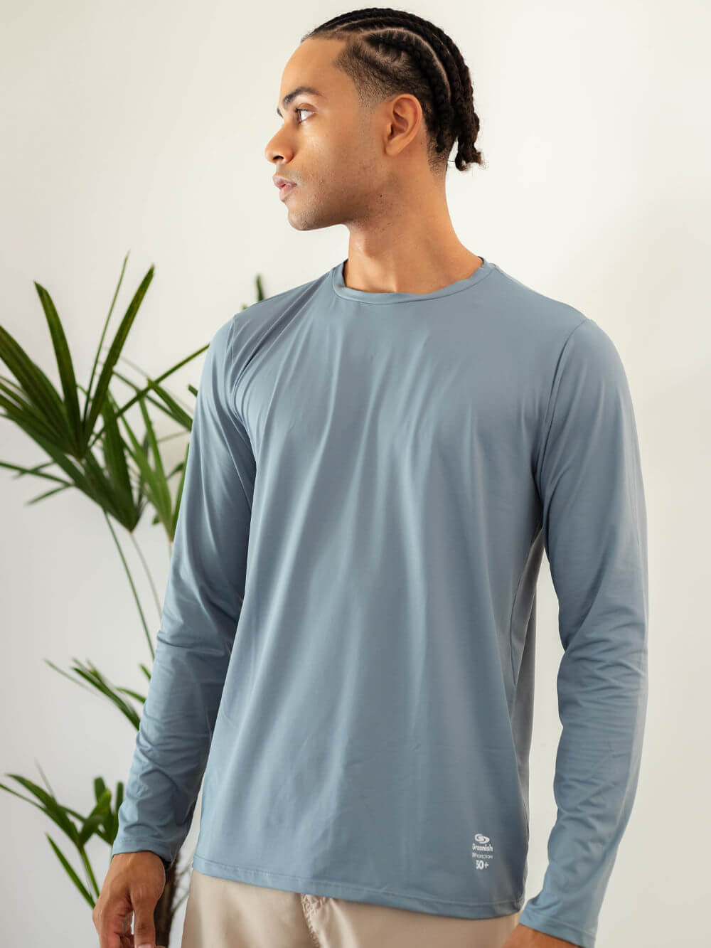 Camisa UV Manga Longa Basic em turquesa da Greenish, ideal para atividades ao ar livre e proteção solar.