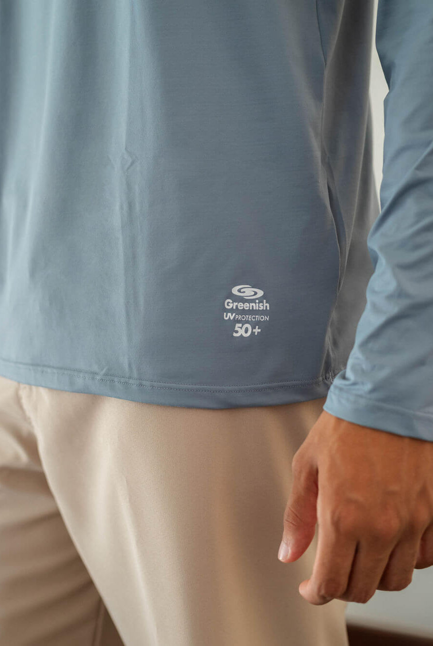 Camisa UV Manga Longa Basic em turquesa da Greenish, proteção solar 50+, ideal para atividades ao ar livre.
