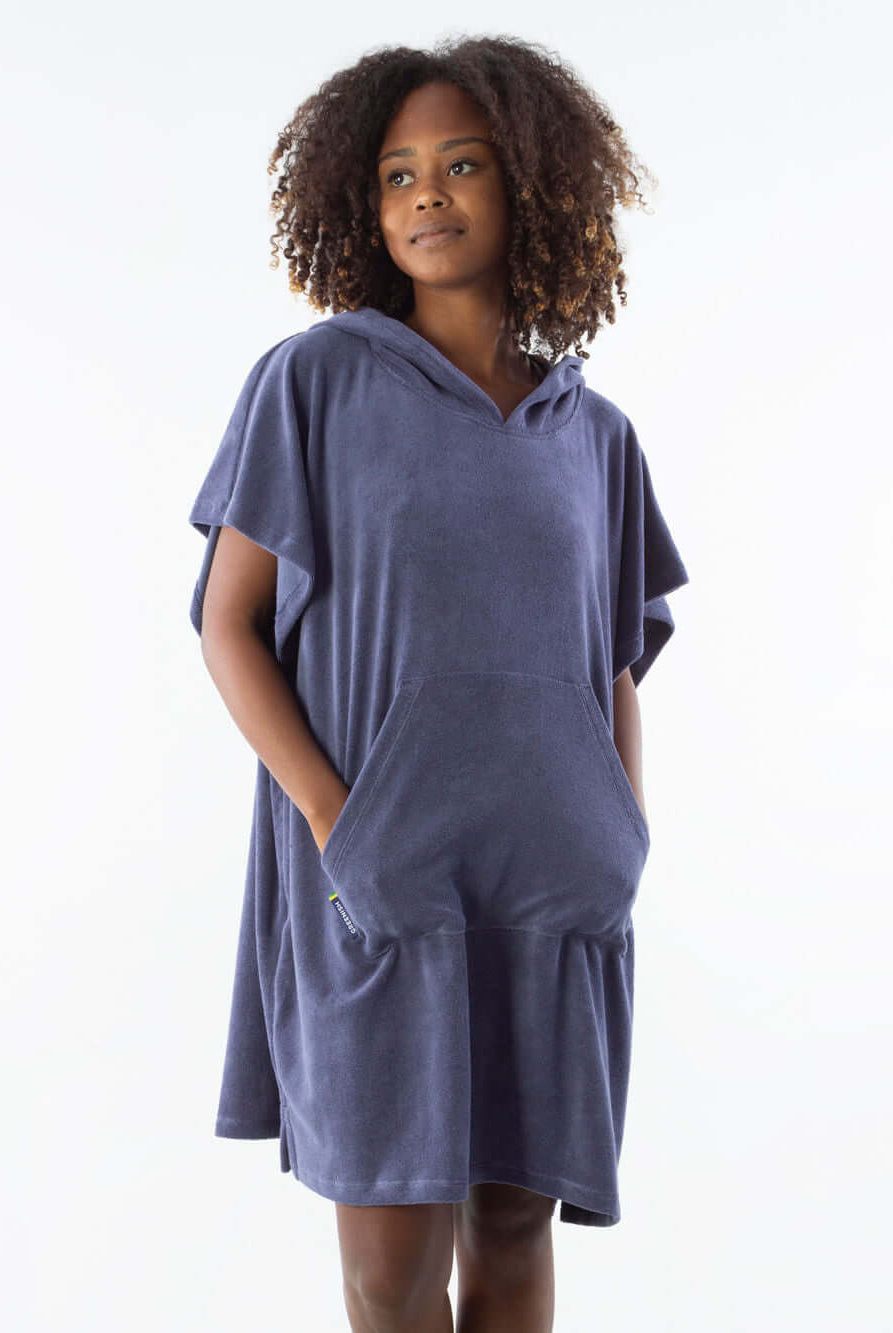 Navy blue short poncho towel with front kangaroo pockets and hood, perfect for beach and water sports.