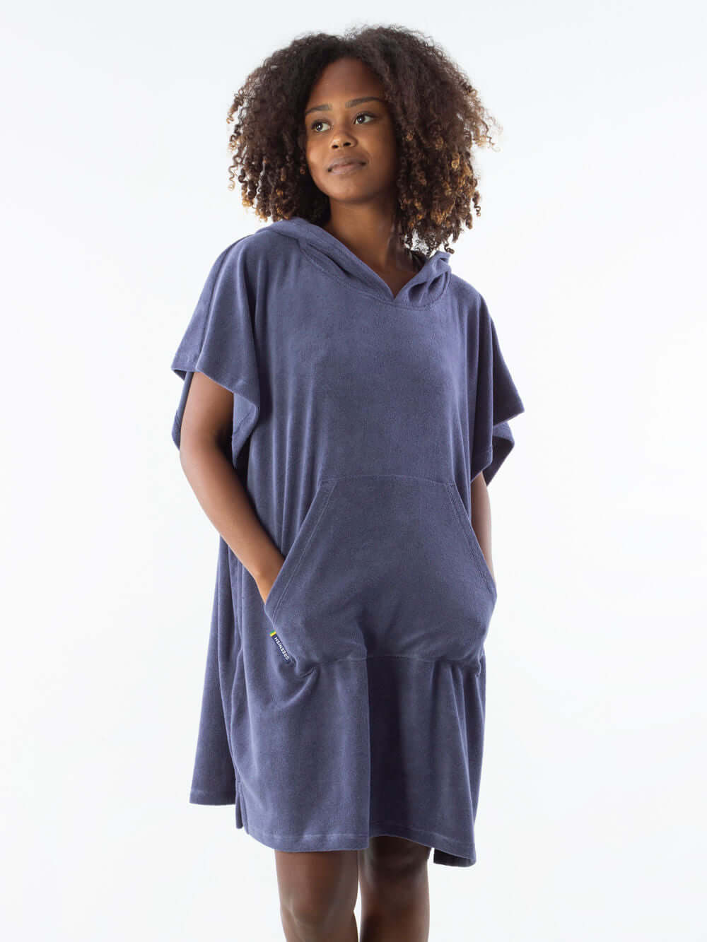 Navy blue short poncho towel with front kangaroo pockets and hood, perfect for beach and water sports.