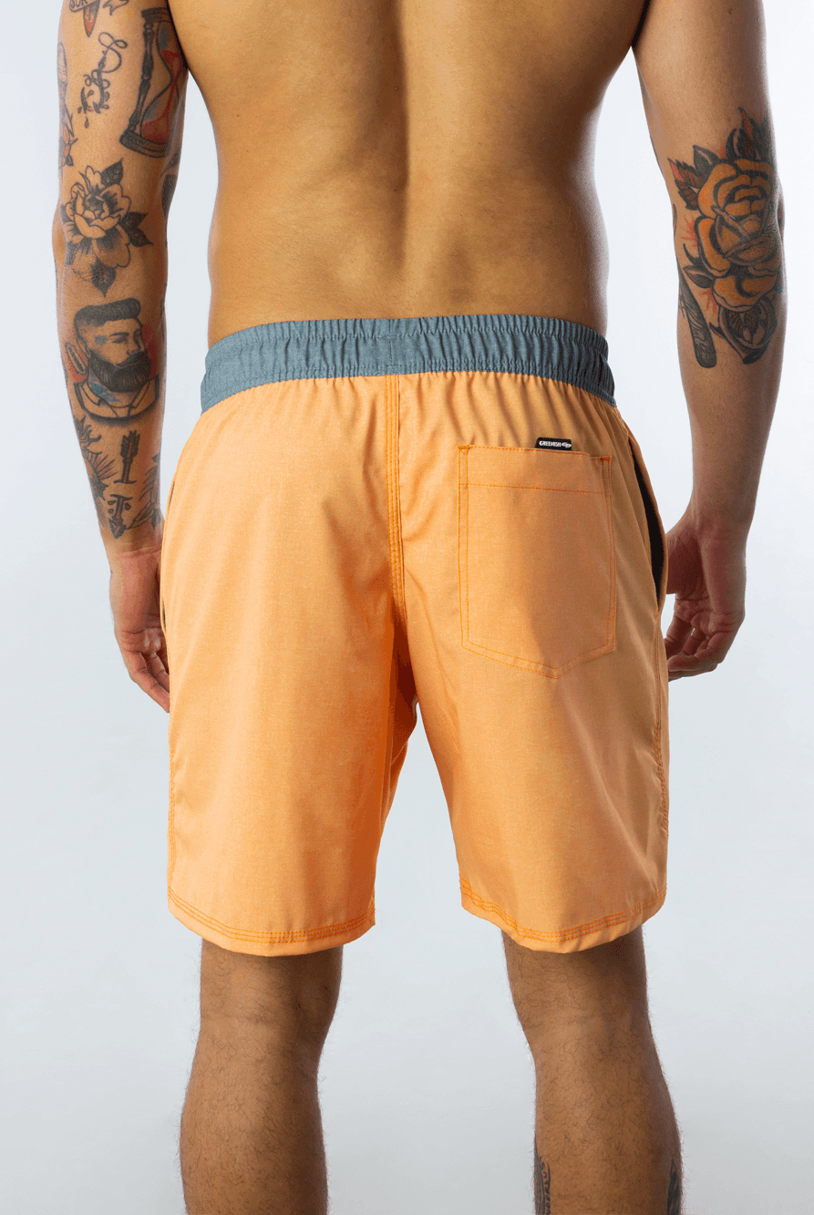 Short vôlei texturizado laranja da marca Greenish, masculino, oferecendo conforto e elasticidade para esportes e passeios.