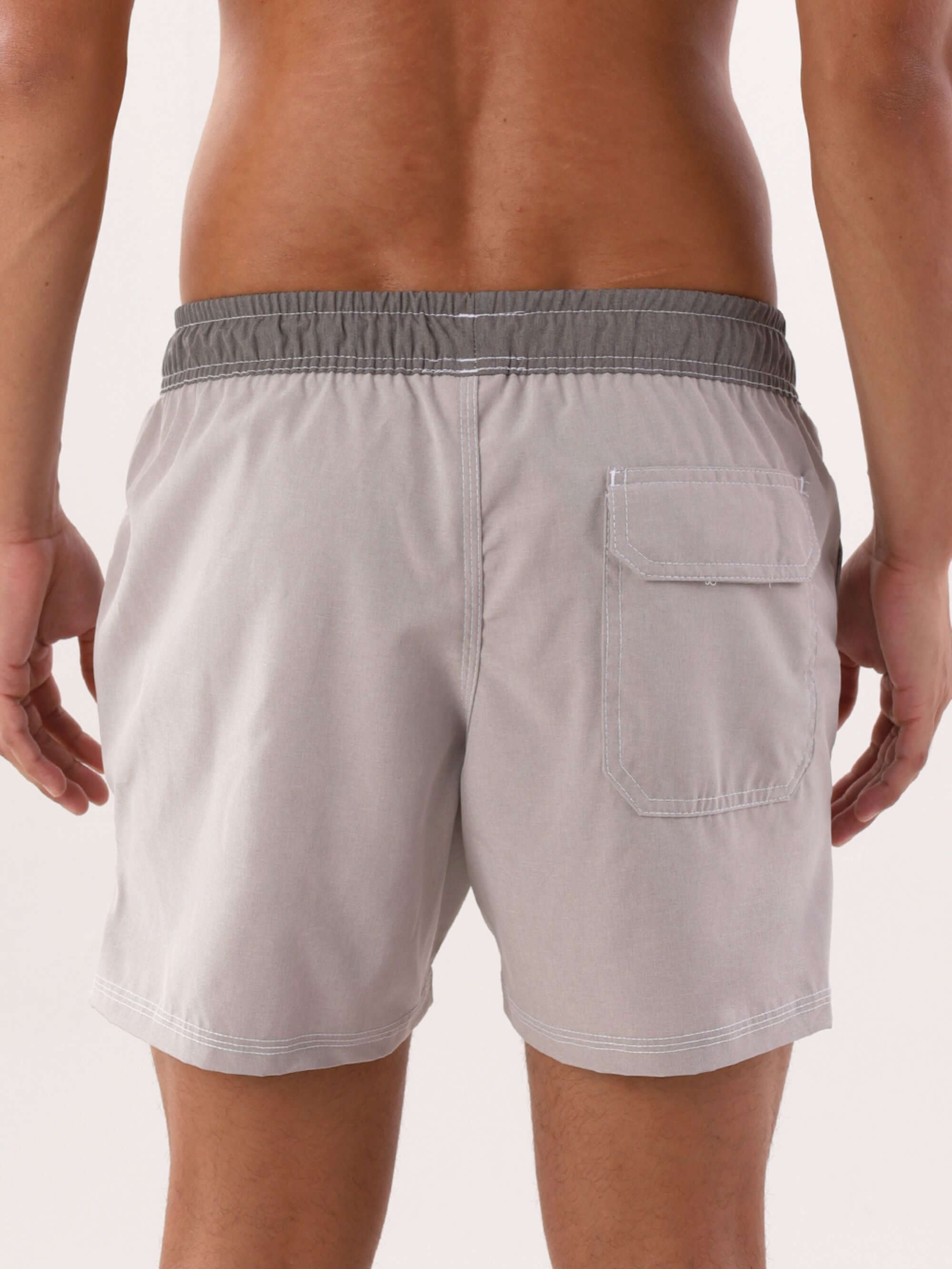 Short Volley Blend Cinza da Greenish, mostrando parte traseira, com bolso em velcro e design confortável.