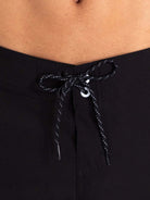 Close-up of the Boardwalk New Basic shorts waistband, featuring a double anatomical fit and adjustable drawstring. Greenish brand.