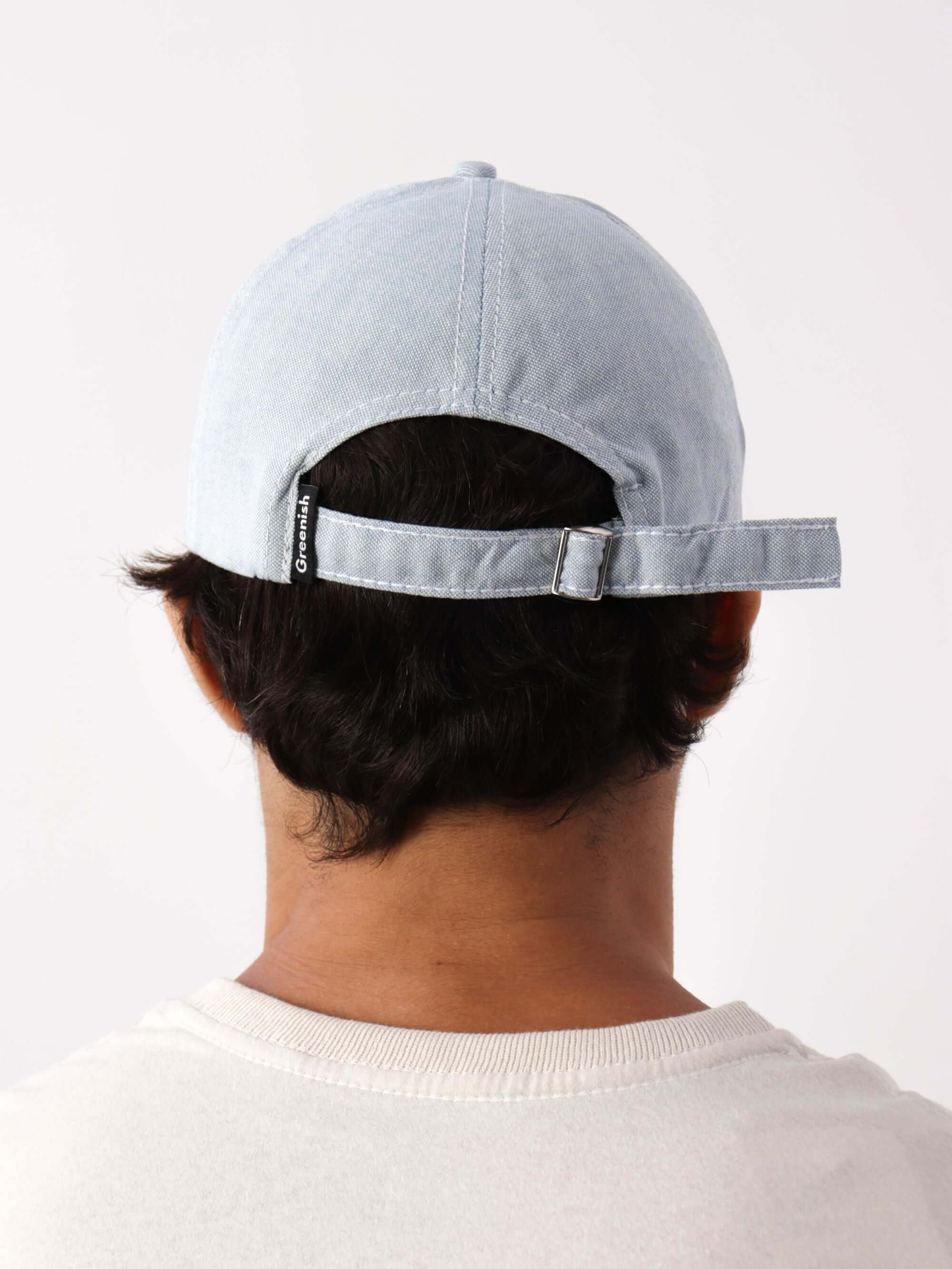 Boné Nineties azul da marca Greenish, vista traseira com fechamento regulável, estilo moderno e casual.