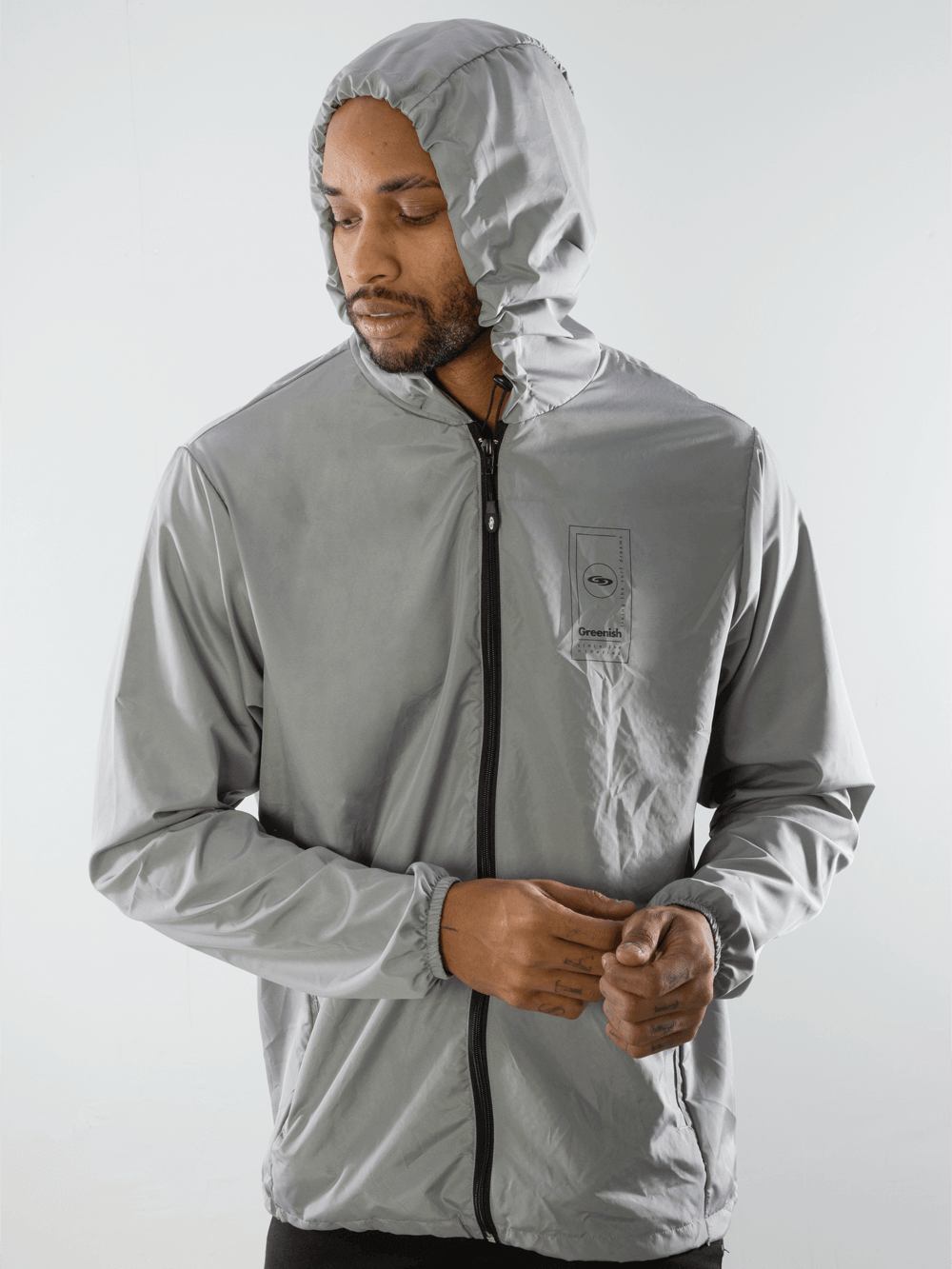 Cortavento Dreamms cinza da Greenish, leve e portátil, ideal para ventos intensos e aventuras.