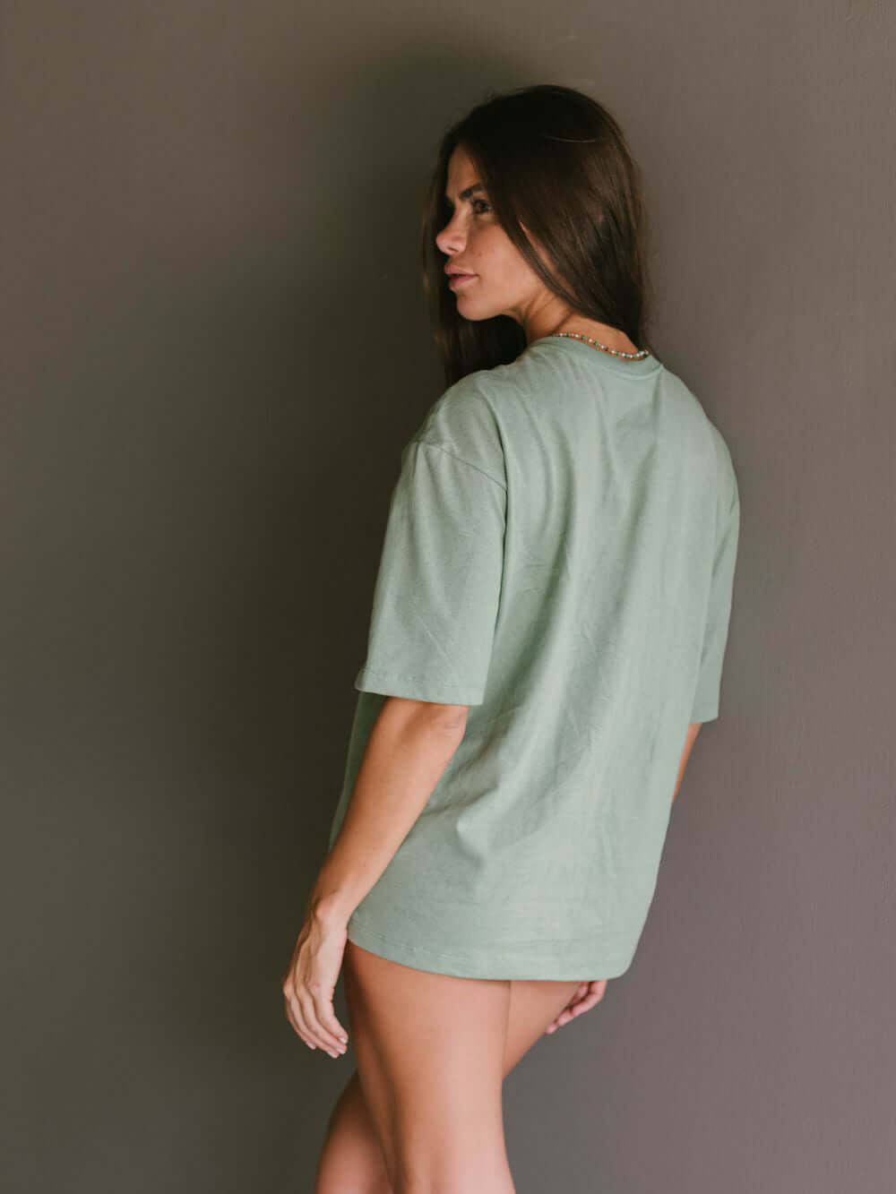 T-shirt oversized verde "Take Care Of Yourself" da Greenish, conforto e estilo streetwear.