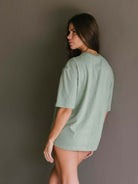 T-shirt oversized verde "Take Care Of Yourself" da Greenish, conforto e estilo streetwear.