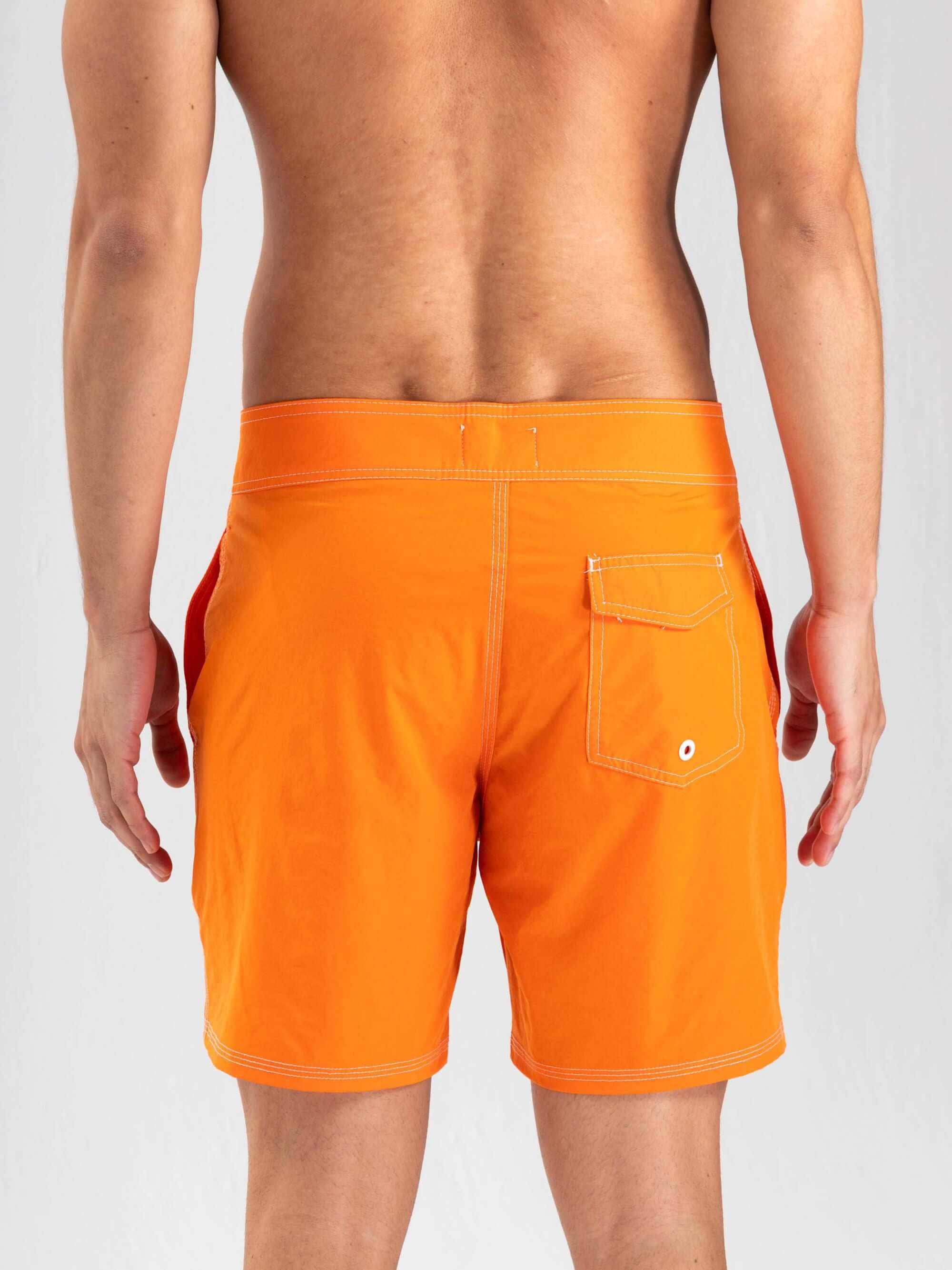 Shorts boardwalk Vintage Light Laranja da Greenish, com bolso traseiro e caimento confortável.