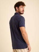 CAMISA POLO RETILINEA AZUL MARINHO da Greenish, com gola clássica e três botões, ideal para looks casuais.