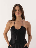 Blusa Mango preta da marca Greenish, ideal para o verão, com design leve e elegante em estilo casual.