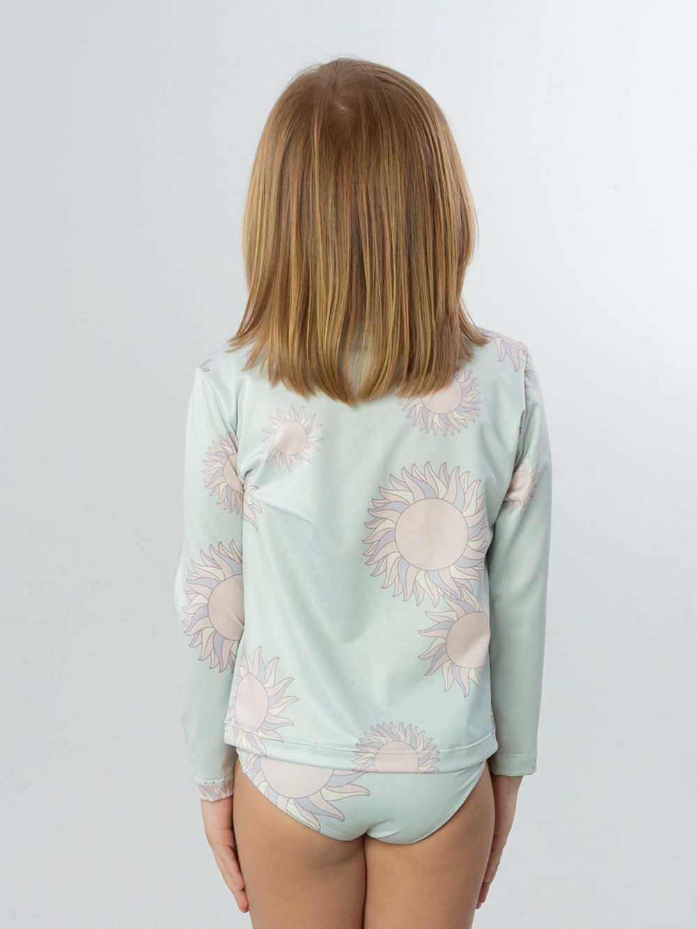 Conjunto UV feminino The Sun da Greenish, azul claro com estampa de girassóis, ideal para proteção solar.