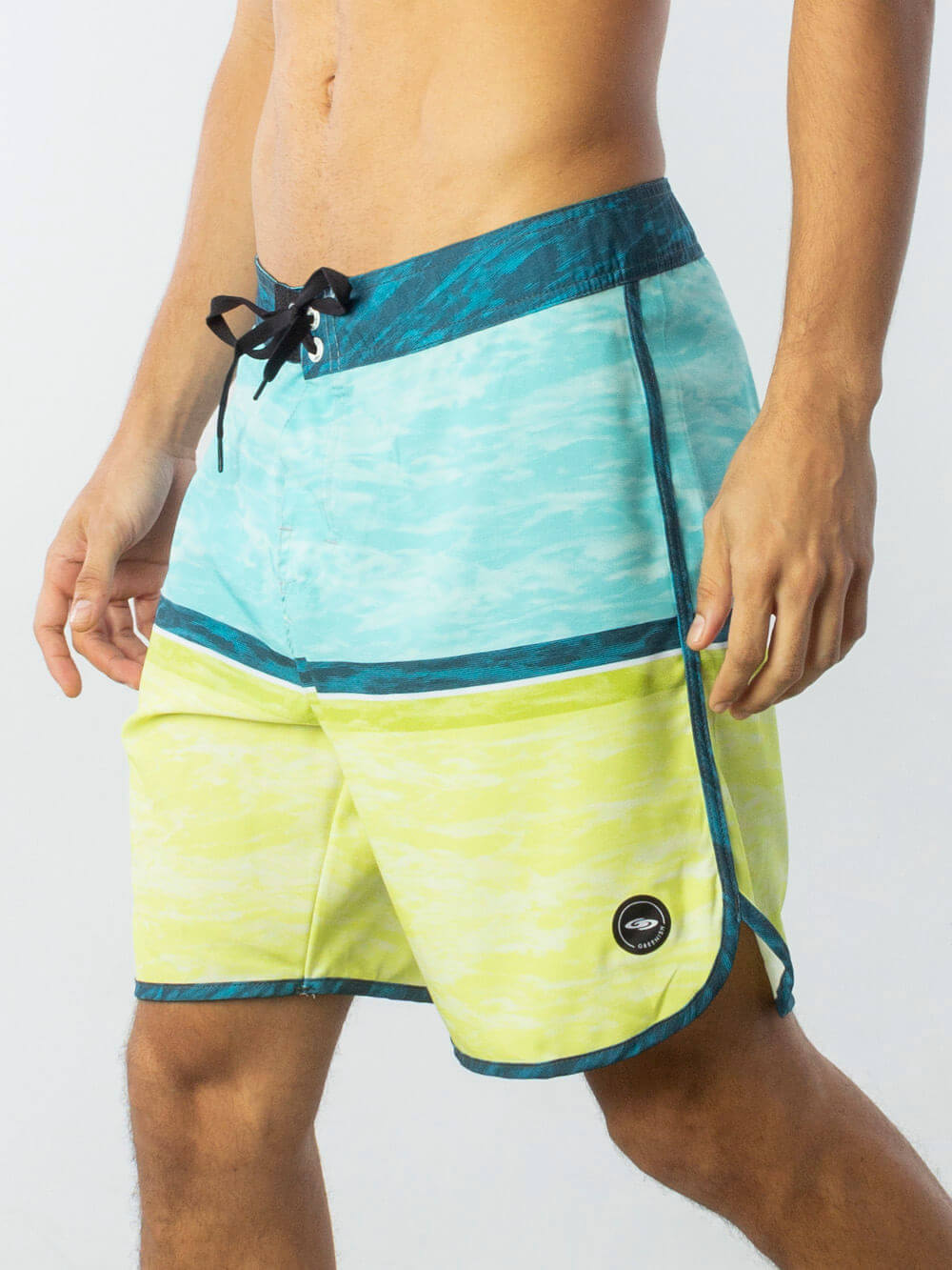Greenish BOARDSHORT HALFTONE WATER TEXTURE AZUL, stylish swim shorts with vibrant blue and yellow design.