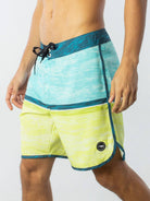 Greenish BOARDSHORT HALFTONE WATER TEXTURE AZUL, stylish swim shorts with vibrant blue and yellow design.