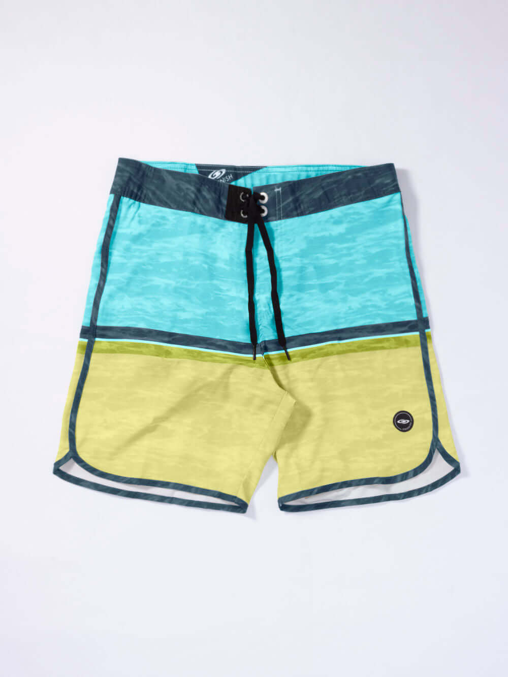 Greenish BOARDSHORT HALFTONE WATER TEXTURE - AZUL, vibrant surf shorts with blue and yellow tones for beach adventures.