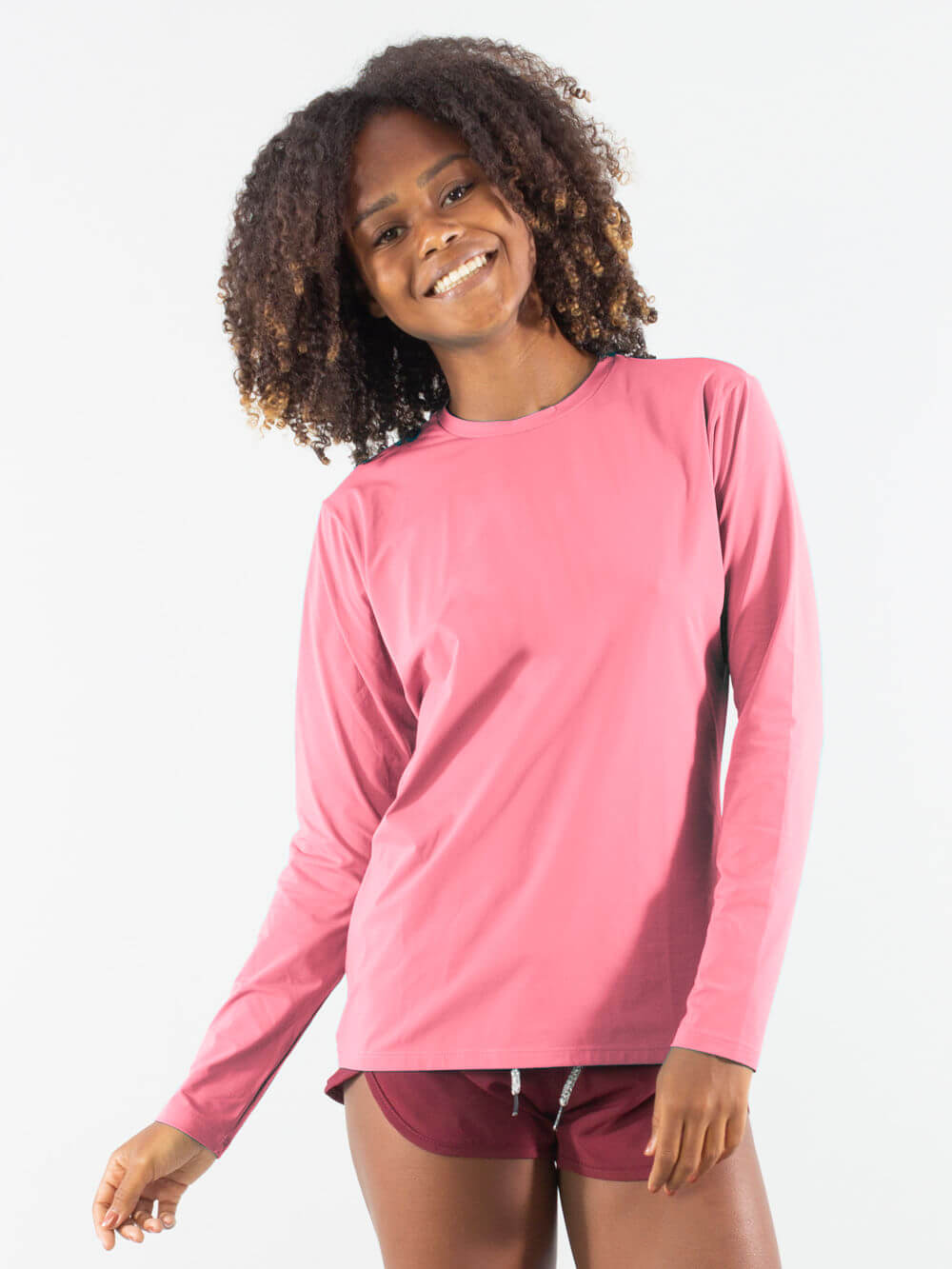 Camisa UV feminina rosa claro da Greenish, ideal para proteção solar e conforto em atividades ao ar livre.