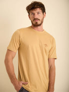 Camiseta Interdependence caqui da Greenish, modelagem oversized, 100% algodão, estilo streetwear minimalista.
