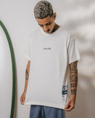 Camiseta oversized Wild Mushroom Off White da marca Greenish, estilo moderno e casual.