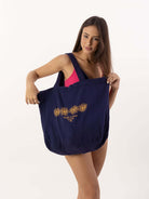 Ecobag Sun Flower Azul Marinho da Greenish, bolsa ecológica com estampa de girassóis e alças reforçadas.