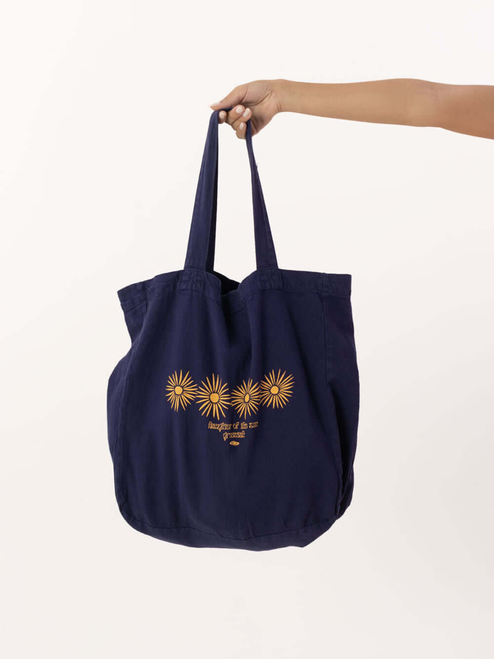 Ecobag Sun Flower da Greenish em azul marinho, com estampa de girassóis, ideal para estilo sustentável.