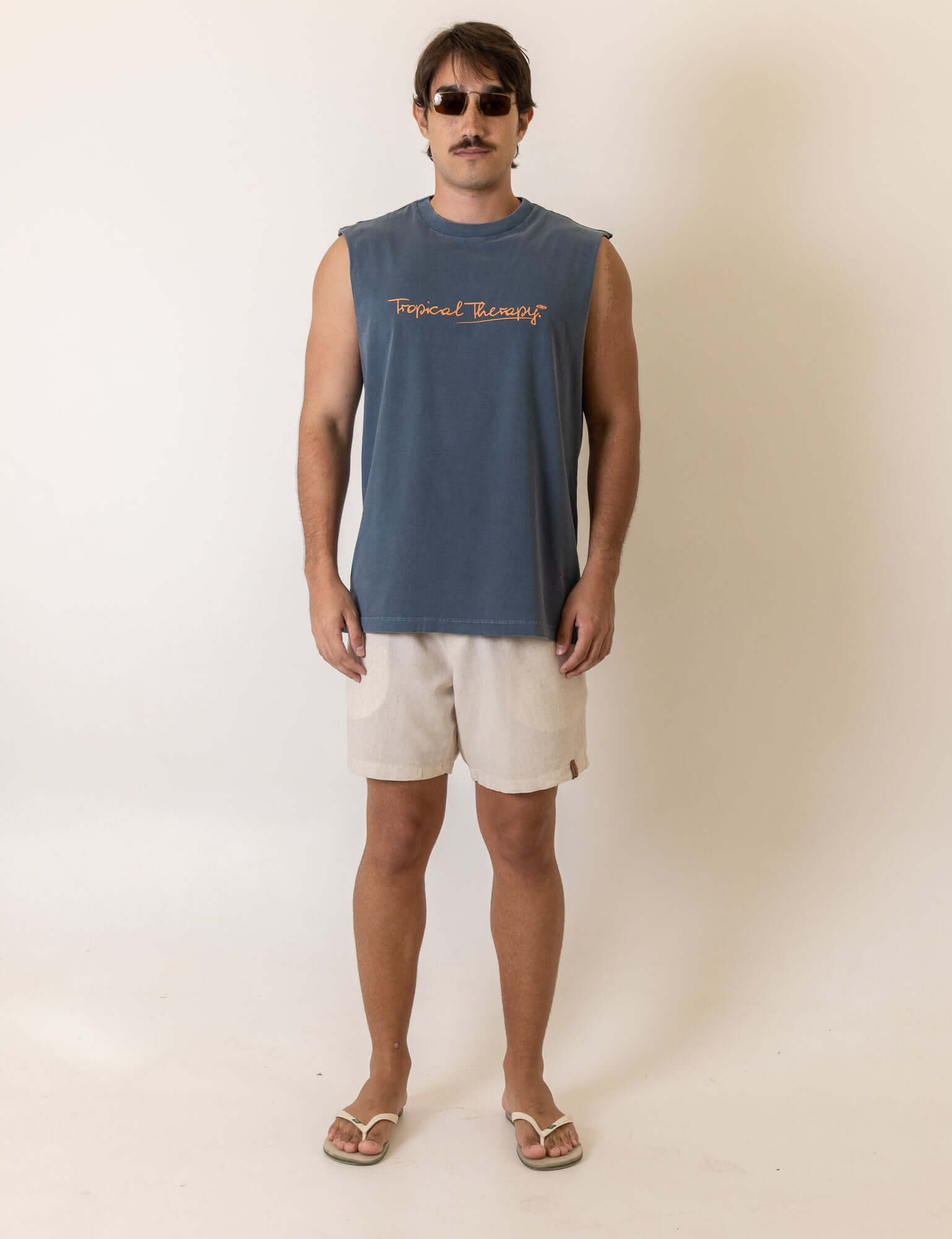 Greenish Regata Larga Tropical Terapy - Azul Marinho, stylish sleeveless top with relaxed fit and tropical design.