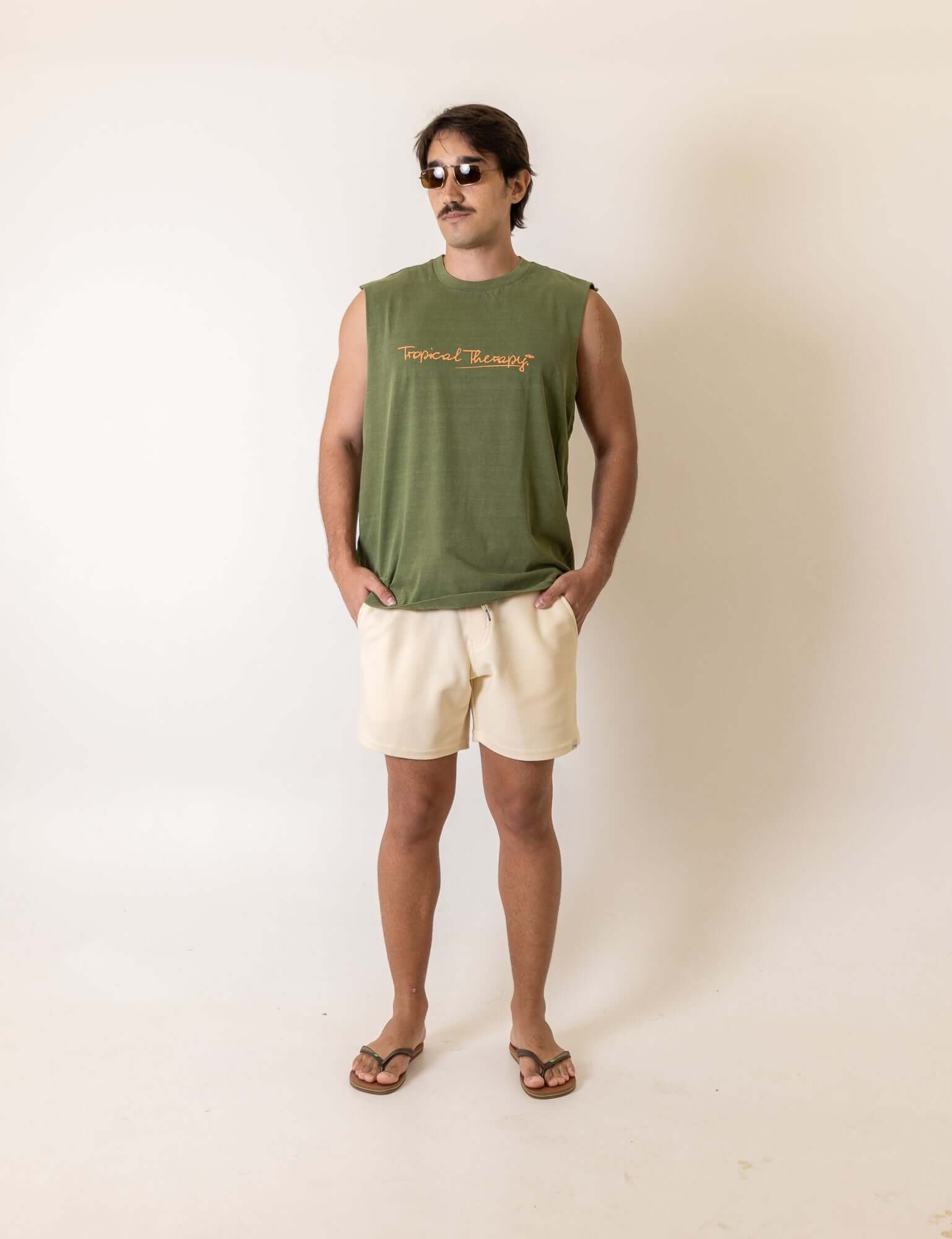 Greenish Regata Larga Tropical Terapy - Verde sleeveless shirt featuring a relaxed fit, perfect for casual wear.