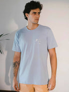 Camiseta azul da Greenish, estilo casual, confortável, fabricada em 100% algodão, ideal para amantes do surf.